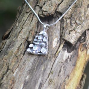 Discover the Triangle Bobble Pendant in Silver, a standout piece of pendant jewellery. Perfect pendants for women who value modern elegance and unique design.